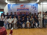 Pengurus Pimpinan Pusat (PP) MIO Indonesia foto bersama usai acara buka puasa bersama dan santunan. (Humas MIO Indonesia)