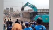 Proses pembongkaran ratusan bangunan liar di sekitar flyover Cikampek. (Ist)